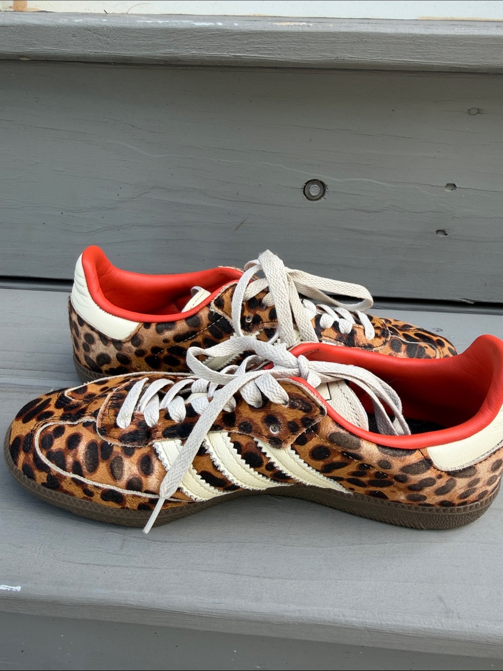 adidas women’s Leopard Print Sneakers with White Stripes and orange trim. - Picture 7 of 10